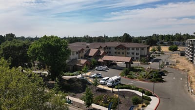 Aerial view of the facility exterior and surrounding landscape