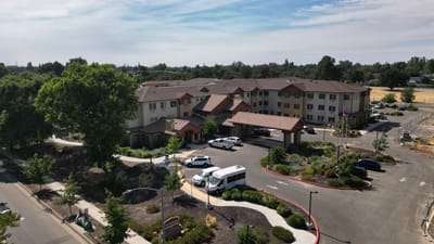 Aerial view of The Woodlake Senior Living facility exterior