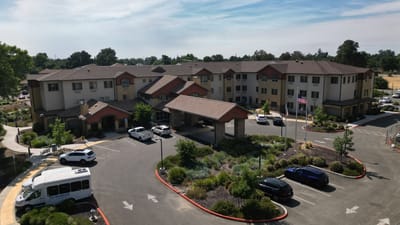 Aerial view of The Woodlake Senior Living facility's entrance