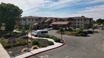 Exterior view of The Woodlake Senior Living facility