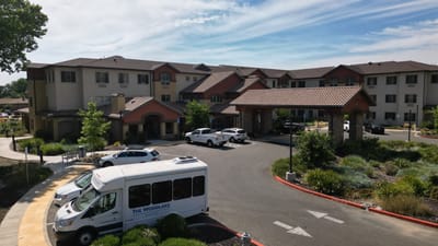 Exterior view of The Woodlake Senior Living facility