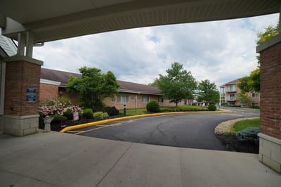 Entrance view of St. Paul Village with landscaping