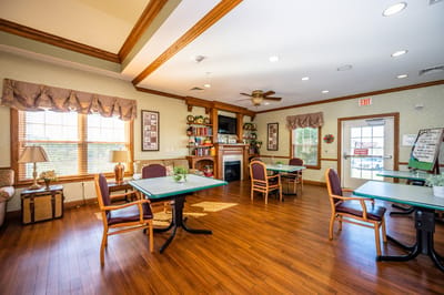 Bright common area with tables and chairs