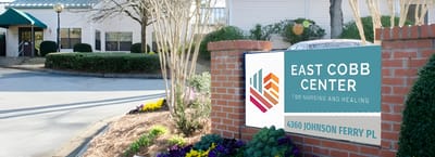 Facility logo displayed outside the main entrance