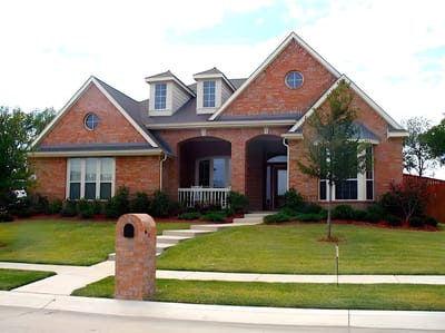 Exterior view of a residential building with garden