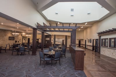 Bright dining area with tables and chairs