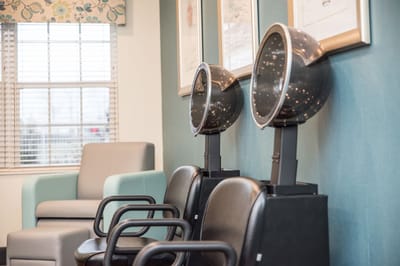 Hair dryers in a salon area of the facility
