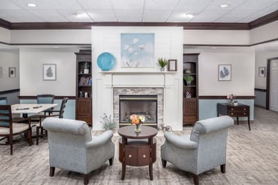 Cozy common area with seating and fireplace