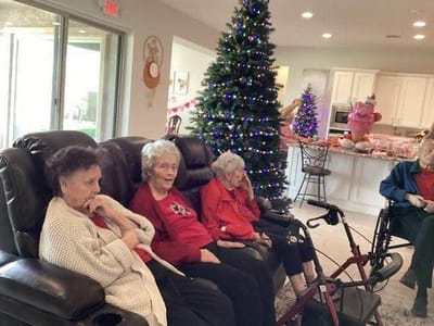 Residents relaxing in a common area during the holidays