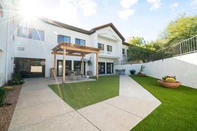 Stylish outdoor area with seating and greenery