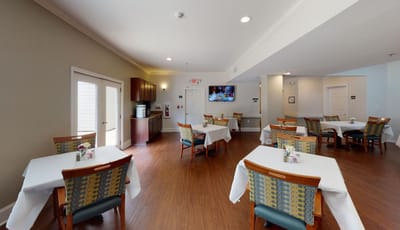 Bright dining room with neatly arranged tables