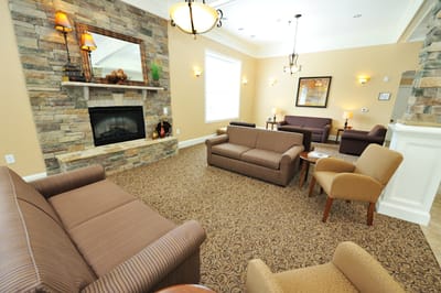 Cozy common area with comfortable seating and fireplace