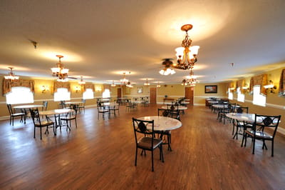 Bright dining room with tables and chairs