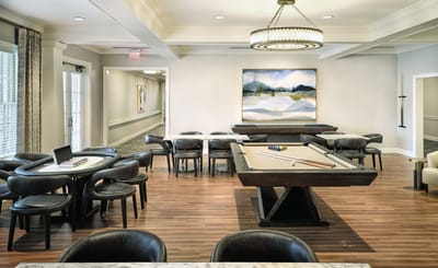 Bright common area with billiards and seating