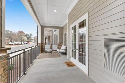 Outdoor seating area with entrance to the facility