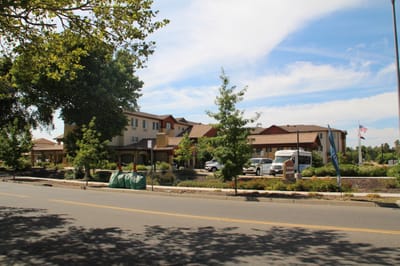 Exterior view of The Woodlake Senior Living facility