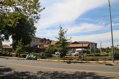 Exterior view of The Woodlake Senior Living facility