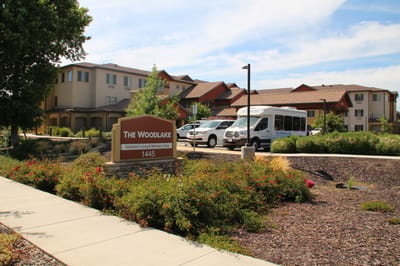 Exterior view of The Woodlake assisted living facility