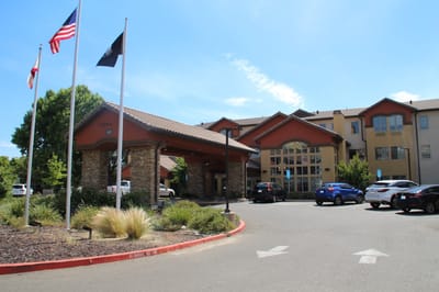 Exterior view of The Woodlake Senior Living entrance