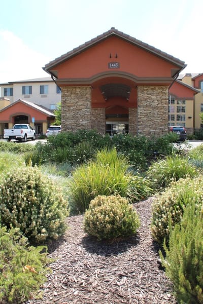 Exterior view of The Woodlake Senior Living entrance