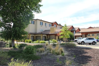 Exterior view of The Woodlake Senior Living facility