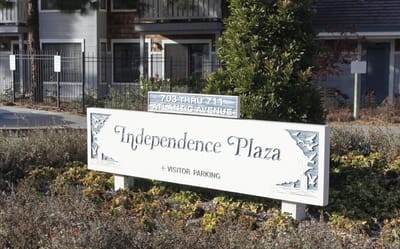 Sign for Independence Plaza outside the facility