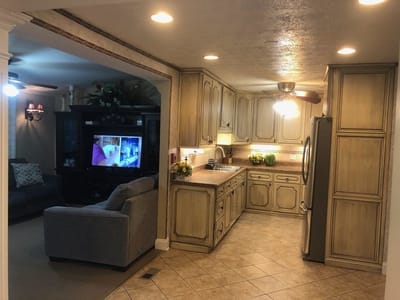 Interior view of a kitchen and living area in a care facility
