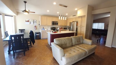 Interior view of a kitchen and living area in a facility