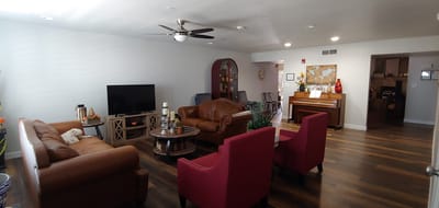 Interior common area with seating and piano