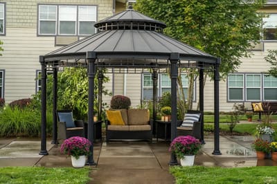 Outdoor gazebo with seating and flowers