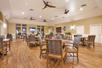 Bright dining area with tables and chairs