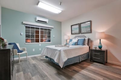 Cozy private resident room with bed and decorations