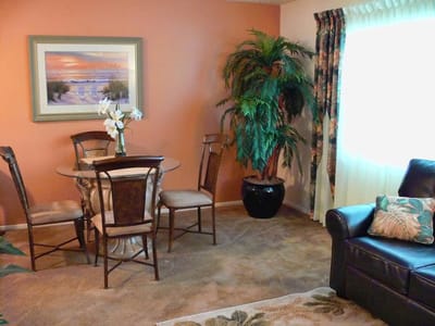 Brightly decorated living area with a dining table