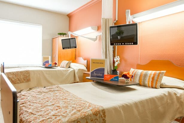 Shared resident room with beds and decorative touches