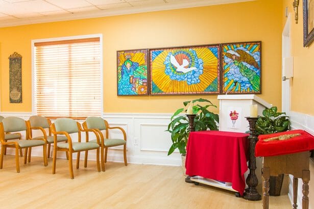 Common area with stained glass art and seating