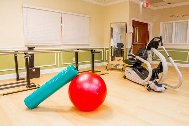 Well-equipped therapy room with exercise equipment