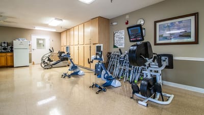Fitness area with exercise equipment and mobility aids