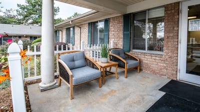 Outdoor seating area with chairs and table
