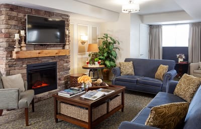 Cozy common area with seating and fireplace