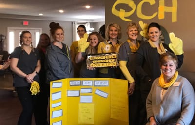Staff members celebrating at Queen City Hospice