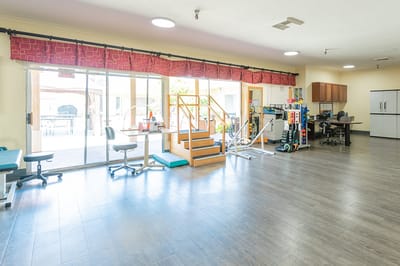 Interior view of a therapy room with equipment