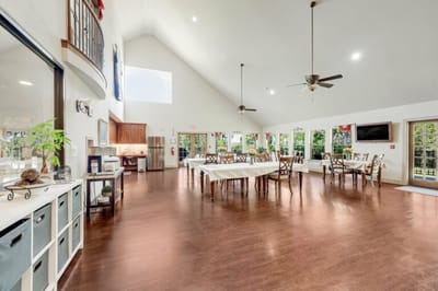 Bright, spacious dining and common area with large windows