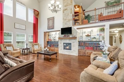 Inviting common area with cozy seating and fireplace
