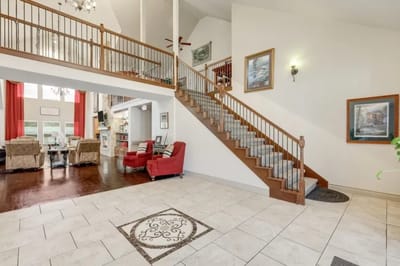 Interior view of a common area with stairs and seating