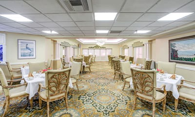 Dining area with elegantly set tables and decor