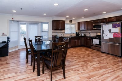 Bright kitchen area with dining table and chairs