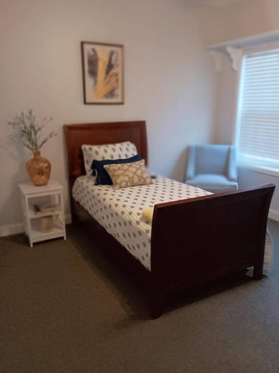 Cozy private bedroom with a bed and decor
