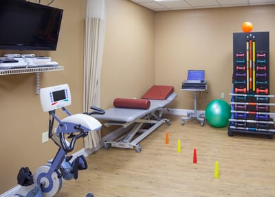 Interior of a physical therapy room with equipment