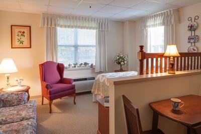 Cozy private resident room with warm lighting and decor