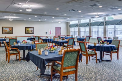 Dining area with tables set for meals